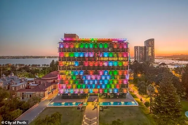 Pictured: the 13-storey Perth Council Chambers lit up with rainbow colours to support LGBTIQ rights topped Mr Zempilas's apology on the council's website. So far no forgiveness has come